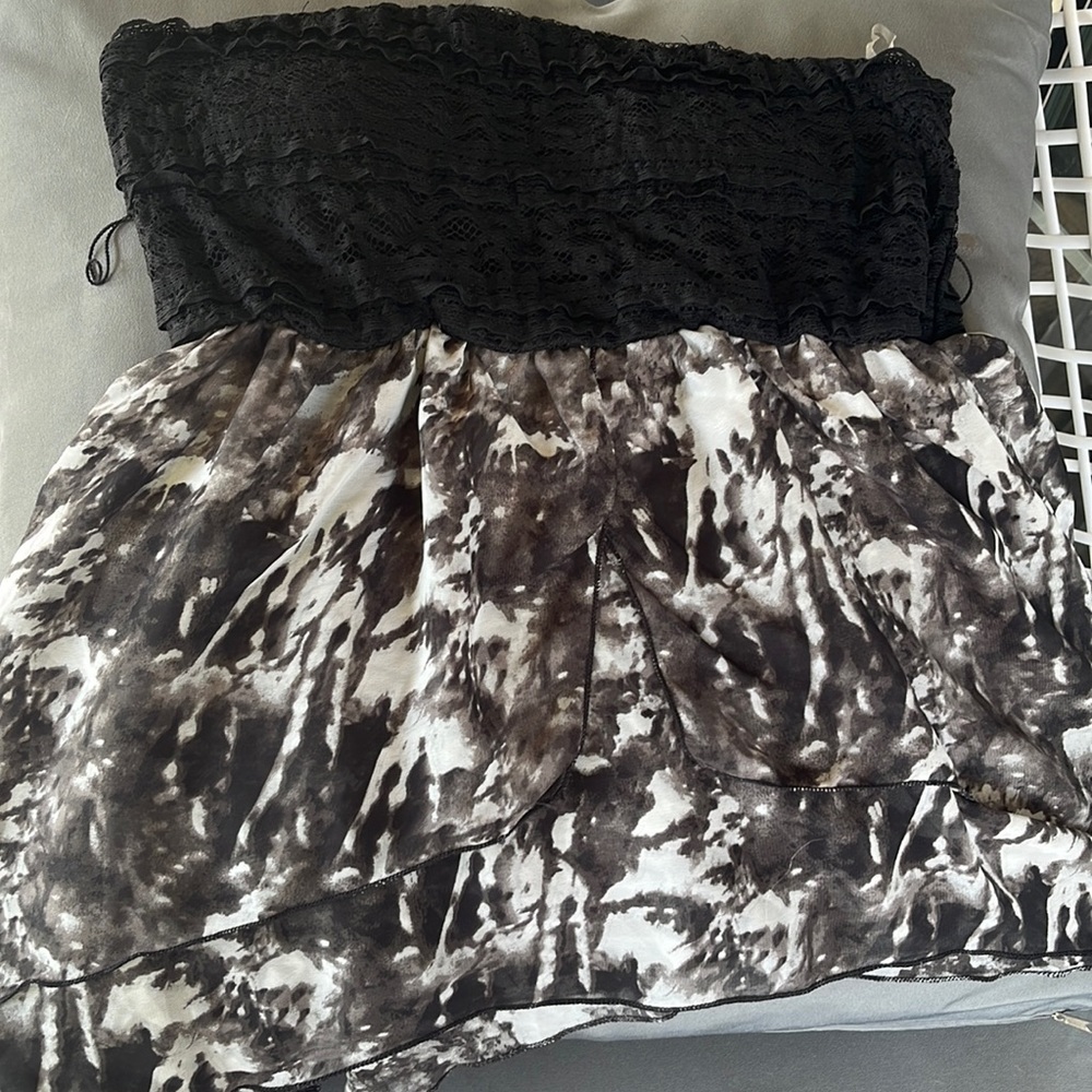 Rue 21 tube top. There is a little snag but it’s still good to wear